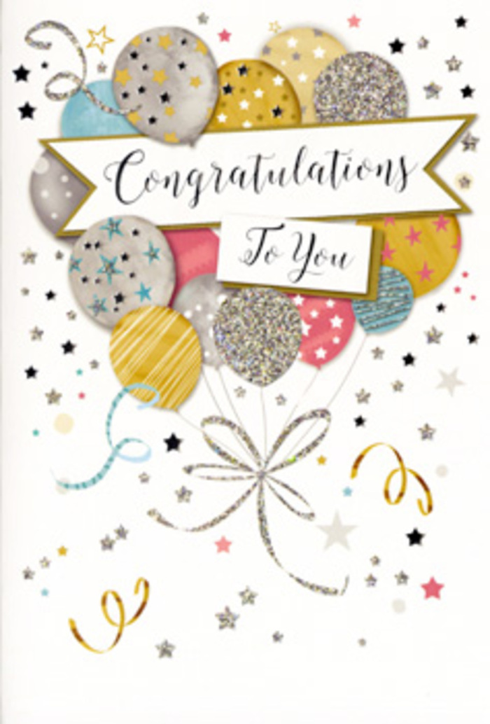 The image focuses on a glamorous congratulations card, styled like a keepsake one might pair with a hand-tied bouquet delivered across Harmondsworth. The card stands upright, revealing a full-front design where a cluster of balloons seems to float weightlessly against a pale, softly speckled background. The balloons are illustrated in a palette of warm metallic gold, soft silver, champagne beige, blush pink, sky blue, and gentle grey, each orb patterned with delicate motifs: tiny stars scattered like evening lights over Harmondsworth's rooftops, thin vertical stripes, and confetti-like sprinkles of glitter. They overlap naturally, creating a sense of depth, as though some are drifting forward while others recede. At their base, slender threads of ribbon in shimmering gold and silver twist and curl downward in loose spirals, converging in a playful knot that anchors the whole arrangement. Around the balloons, small stars, dots, and curling lines of foil dance over the background, echoing the carefree mood of a surprise party or an impromptu celebration along local streets. Across the centre stretches a graceful banner, its ends gently curling, carrying the message Congratulations To You in a refined, flowing script that gives the card an elegant, timeless feel. The metallic lettering catches the light just enough to suggest a low, warm glow rather than a harsh shine. Overall, the design radiates quiet pride and genuine joy, perfectly suited to marking exams, promotions, new homes, or any special success in Harmondsworth, where a thoughtful card and fresh flowers together turn life's achievements into cherished memories.