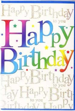 This birthday card presents itself like the first glimpse of a lively celebration, the kind you might see spilling out of a family gathering near Harmondsworth's historic high street. Dominating the front are the words "Happy Birthday," printed in large, rounded letters that seem to hover just above the surface. Each character wears its own hue, progressing in a smooth, rainbow-like gradient that travels from ruby and cranberry tones through warm tangerine and lemon, into grassy green, clear sky blue, and finally a deep, velvety purple. The blending is soft and painterly, suggesting the gradual change of colours you notice walking from the leafy paths near Harmondsworth Moor into the busier village centre. Tiny, multicoloured stars and confetti flecks are scattered around the main phrase, their crisp edges and bright tones echoing the pop of party poppers or the sparkle of fairy lights at an evening get-together. Behind the exuberant lettering lies a creamy, off-white backdrop quietly filled with repeated golden script. In this delicate, looping handwriting, the words "Happy Birthday to you" flow across the card in neat, overlapping lines, like a whispered chorus of well-wishers. The metallic gold ink is subtle but catches any hint of light, creating a gentle shimmer rather than a loud glitter, giving the design a refined, almost keepsake quality. The balance between bold, youthful colour and the sophisticated golden script feels deliberate, making this card suitable for marking a milestone birthday or a simple, heartfelt celebration. It's easy to imagine this card tucked beside a colourful bouquet delivered across Harmondsworth by a florist who understands how to blend joy with warmth.